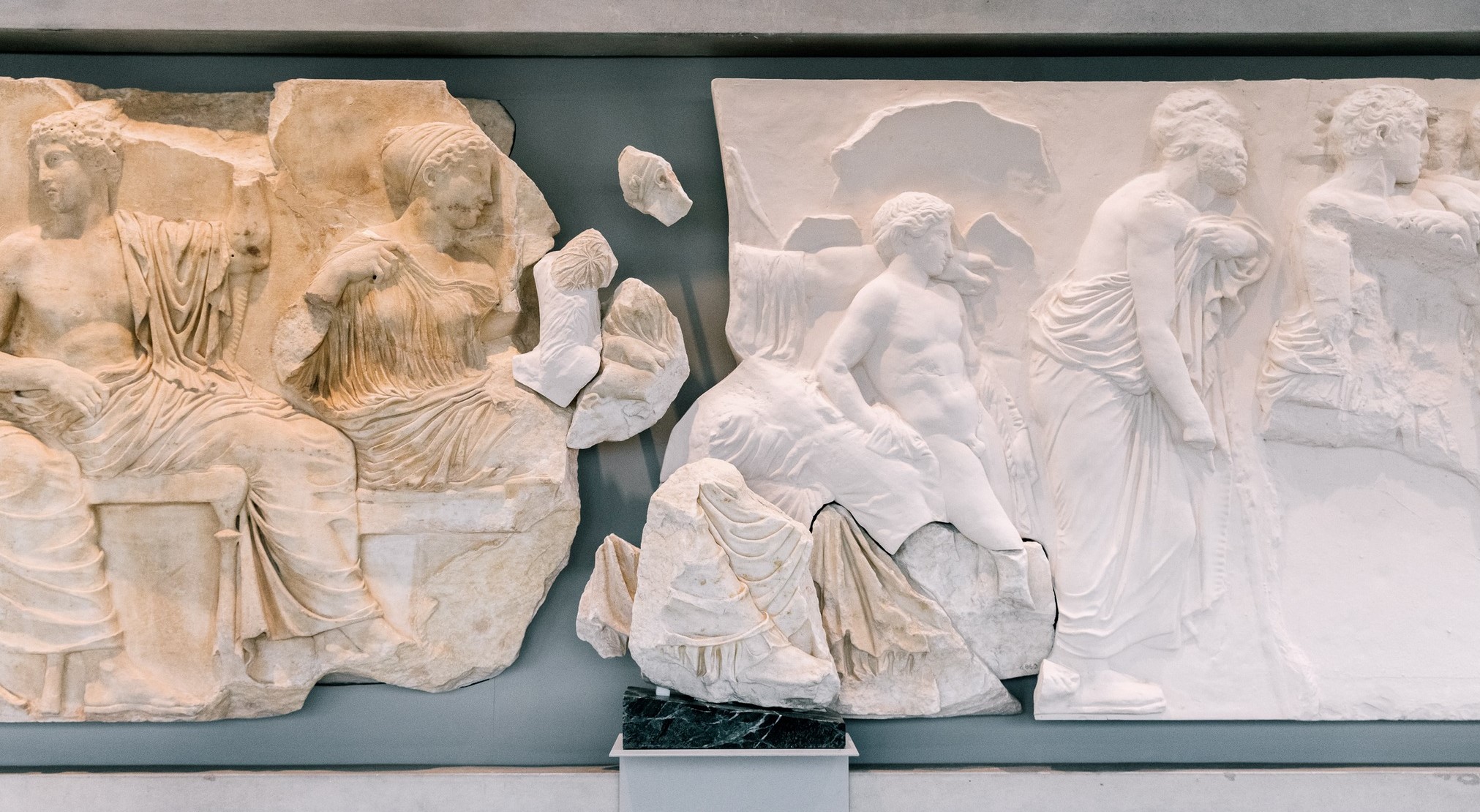 The fragment from Palermo on its base at the position where it is placed at the east frieze at the Acropolis Museum rsz