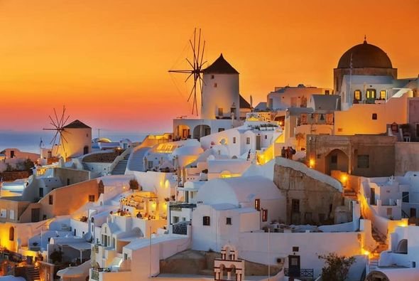 Cycladic architecture, stunningly blending with the endless blue of the Aegean sea